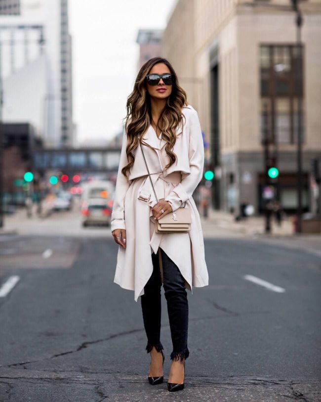 mia mia mine wearing a trench coat from nordstrom and free people fringe denim