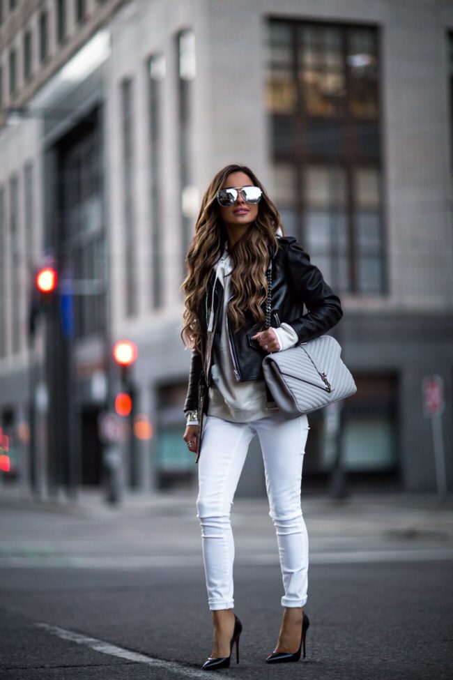 fashion blogger mia mia mine wearing a gray saint laurent college bag and white denim