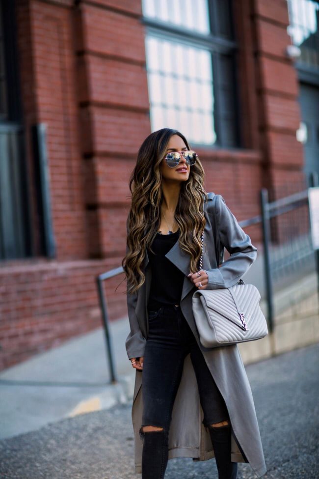 fashion blogger mia mia mine wearing a gray trench coat from nordstrom and a saint laurent college bag