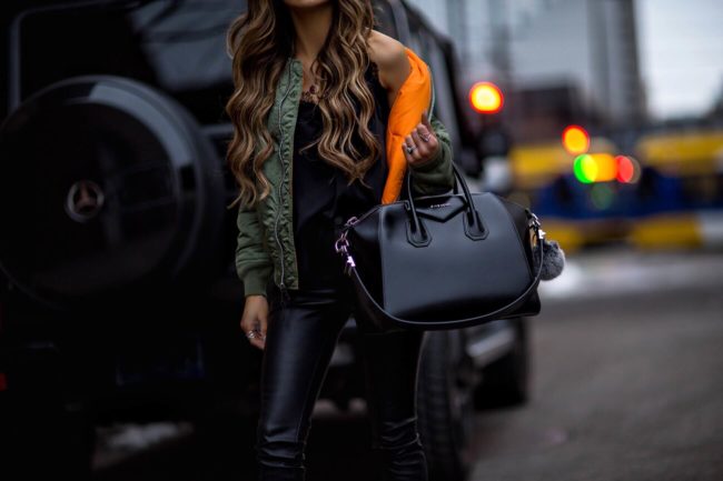 fashion blogger mia mia mine wearing a bomber jacket by alpha industries and a givenchy antigona smooth bag