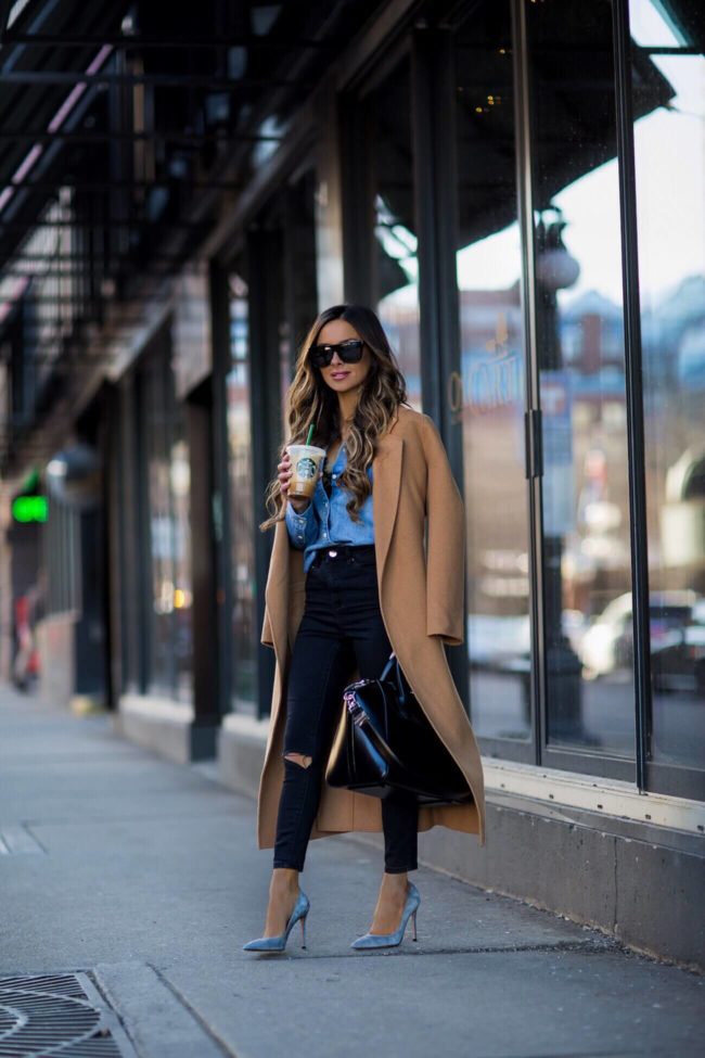 fashion blogger mia mia mine wearing a camel coat from revolve and a j. crew denim shirt from nordstrom