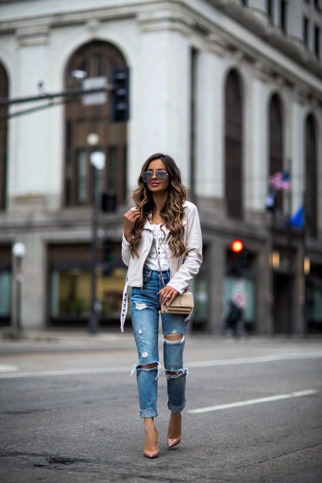 fashion blogger mia mia mine wearing grlfrnd denim from revolve and a saint laurent sunset crossbody bag