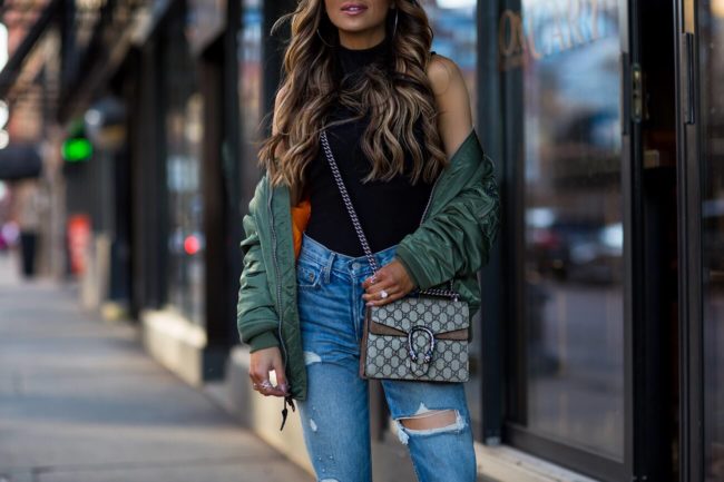fashion blogger mia mia mine wearing a gucci dionysus mini bag