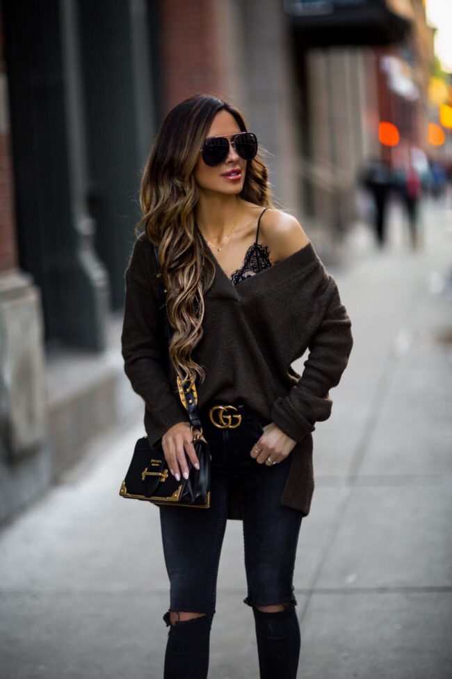 fashion blogger mia mia mine wearing a prada cahier bag and a lace bralette from shopbop