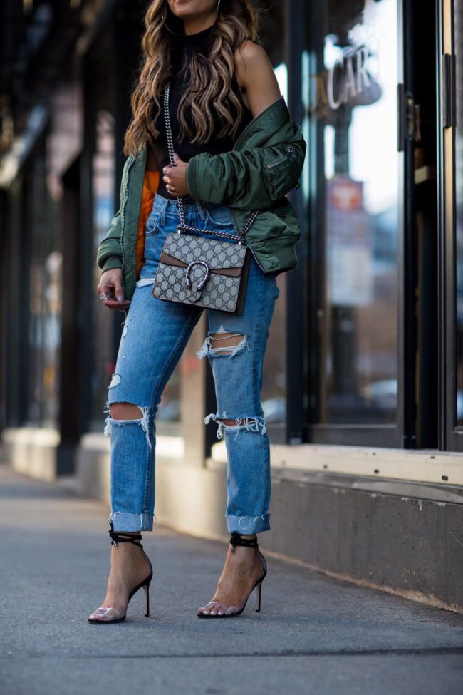 fashion blogger mia mia mine wearing a gucci mini dionysus bag and jimmy choo heels