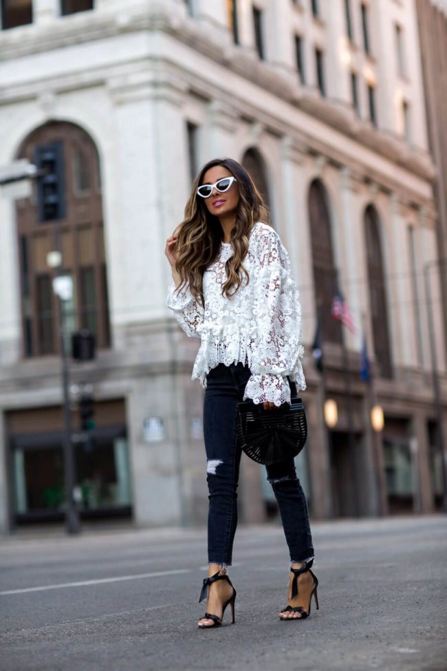 Fashion blogger mia mia mine wearing a white lace top from H&M and bow tie heels by alexandre birman