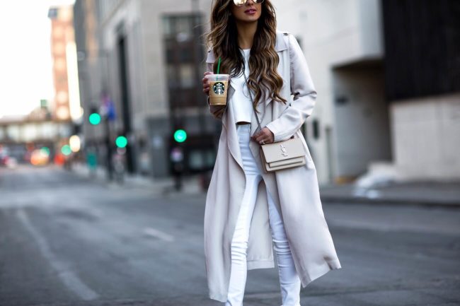 fashion blogger mia mia mine wearing a beige saint laurent sunset crossbody bag