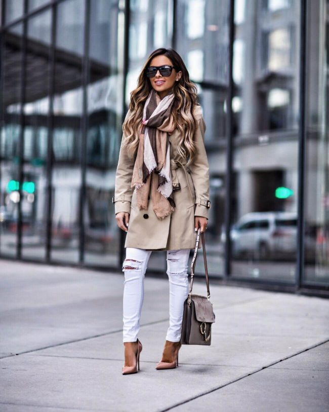 fashion blogger mia mia mine wearing a burberry trench coat
