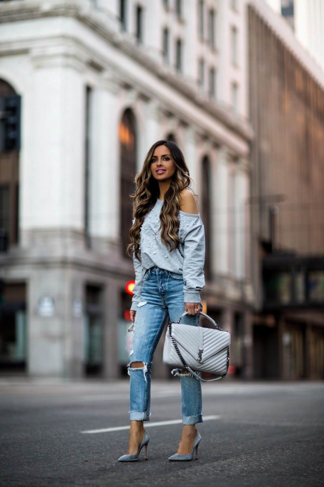 fashion blogger mia mia mine wearing a saint laurent college bag and grlfrnd denim from revolve