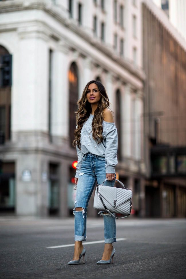 fashion blogger mia mia mine wearing a saint laurent college bag and grlfrnd denim from revolve