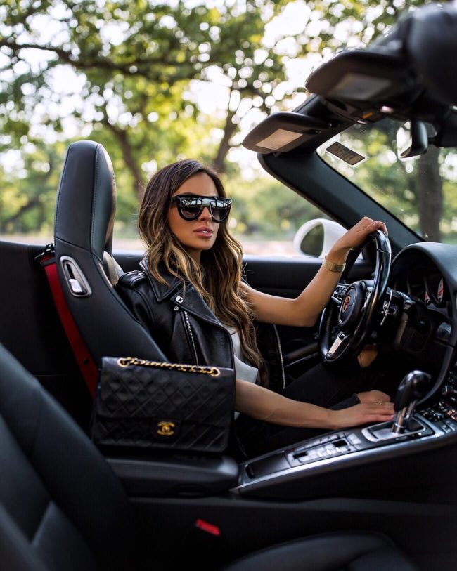 fashion blogger mia mia mine wearing celine sunglasses in a porsche in austin texas