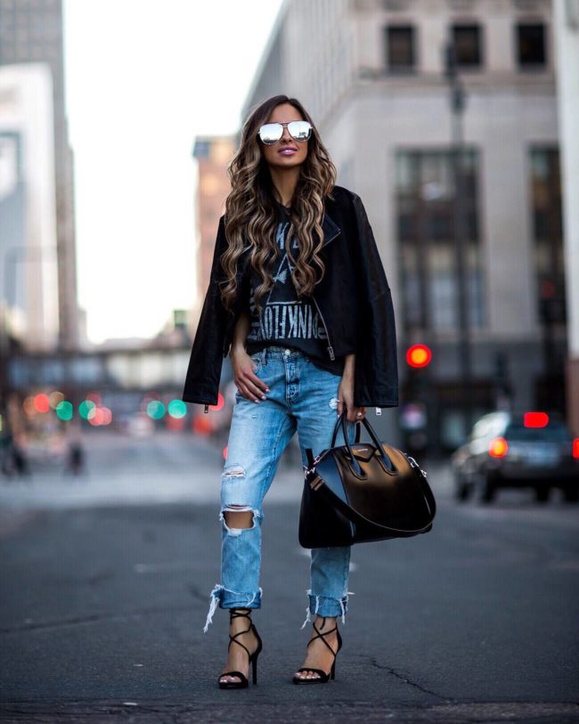 fashion blogger mia mia mine wearing distressed denim and a band tee from macy's