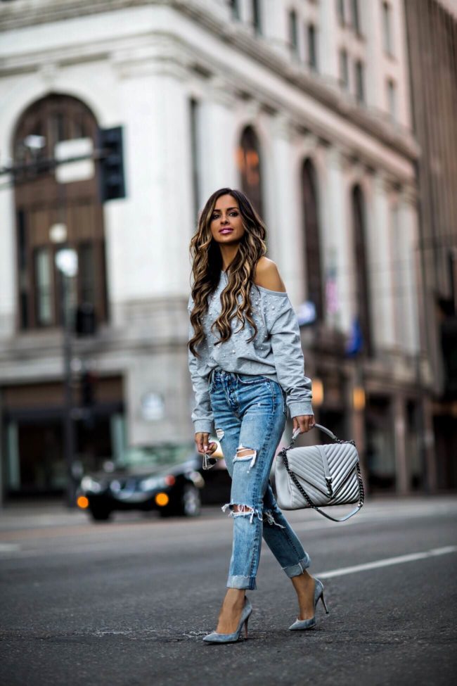 fashion blogger mia mia mine wearing a gray sweatshirt from revolve and gray heels by gianvito rossi