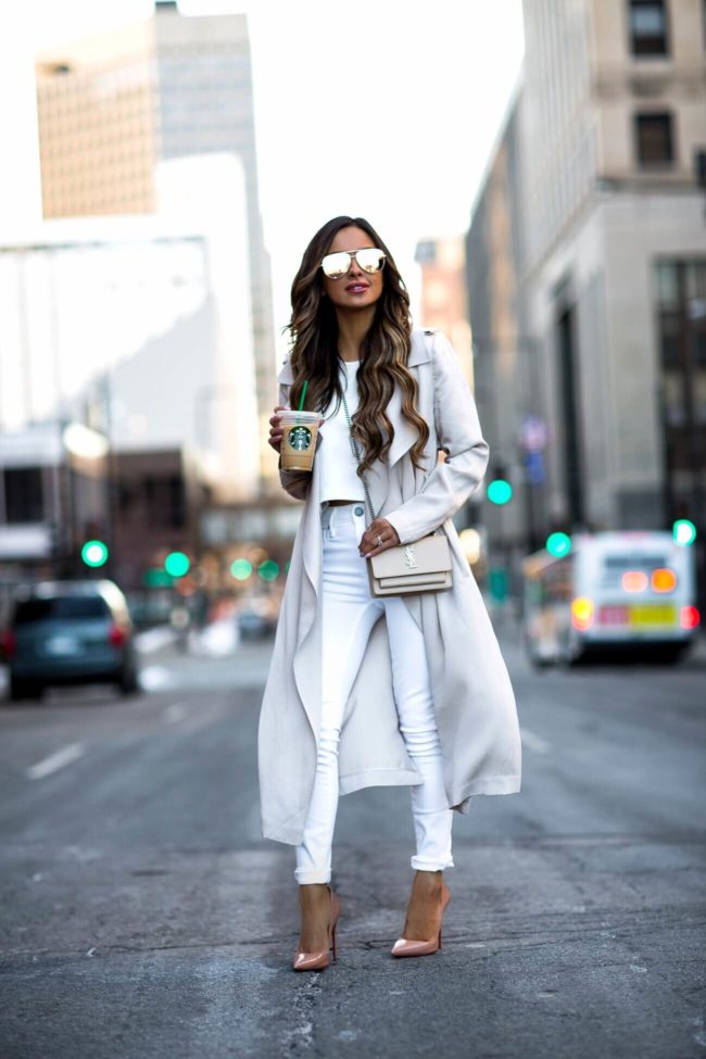 fashion blogger mia mia mine wearing a beige saint laurent sunset crossbody bag and christian louboutin so kate heels