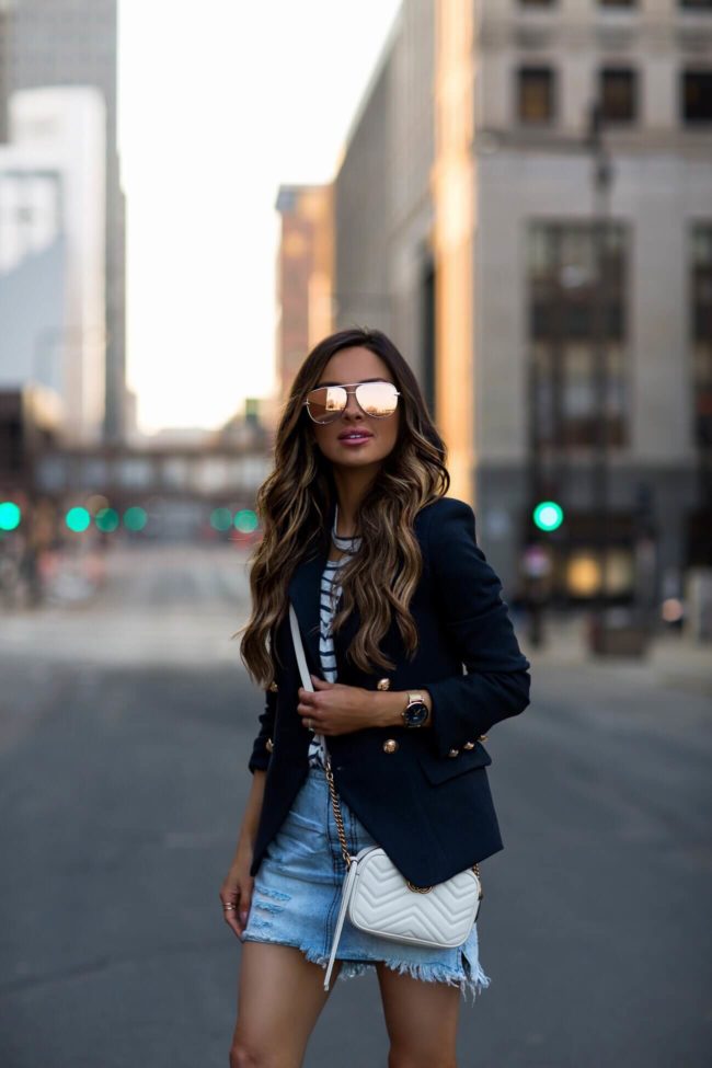 fashion blogger mia mia mine wearing a denim skirt by one teaspoon