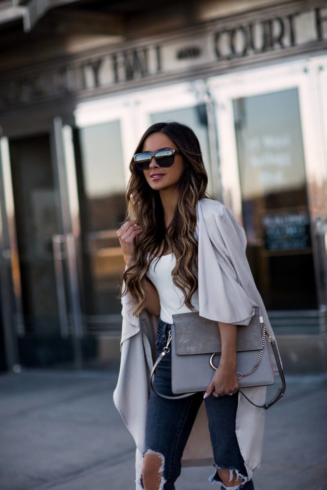 fashion blogger mia mia mine wearing a chloe faye medium bag in motty grey