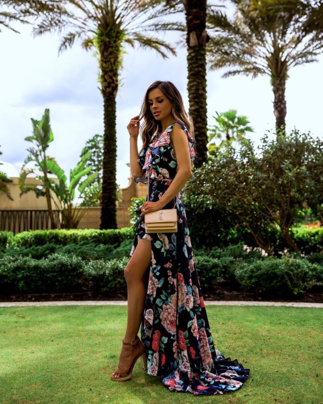 fashion blogger mia mia mine wearing a yumi kim floral maxi dress
