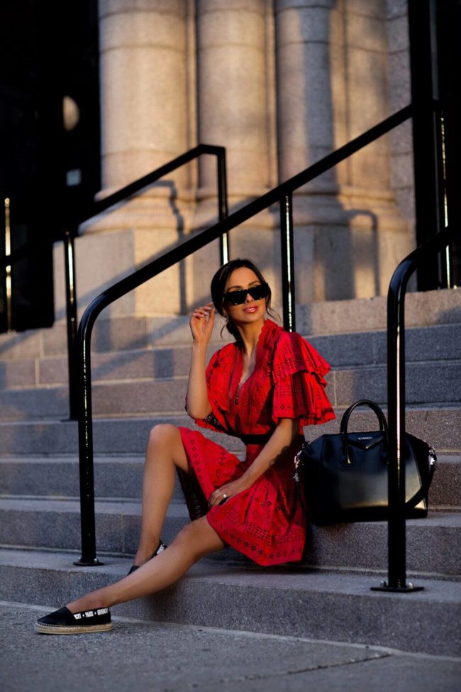 fashion blogger mia mia mine wearing a red lace mini dress by self portrait from harvey nichols