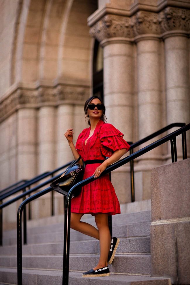 fashion blogger mia mia mine wearing a red lace self portrait dress from harvey nichols