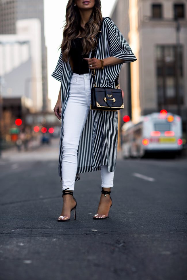 fashion blogger mia mia mine wearing a prada cahier bag and manolo blahnik estro heels
