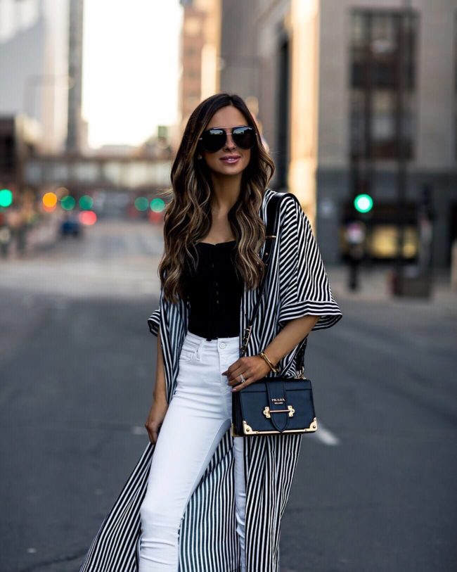 fashion blogger mia mia mine wearing a striped kimono and prada cahier bag