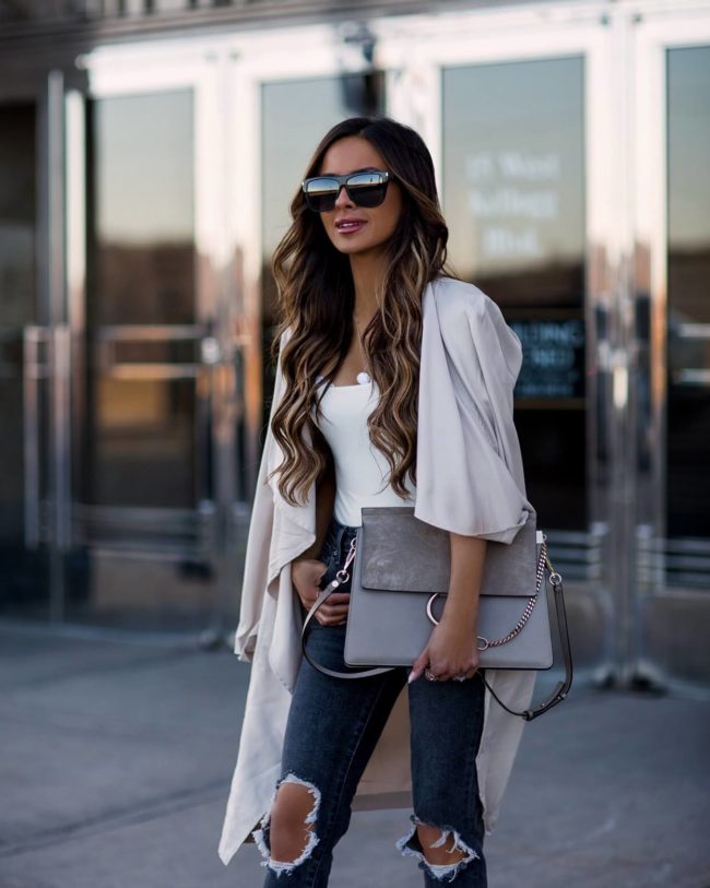 fashion blogger mia mia mine wearing a cupcakes and cashemere trench coat