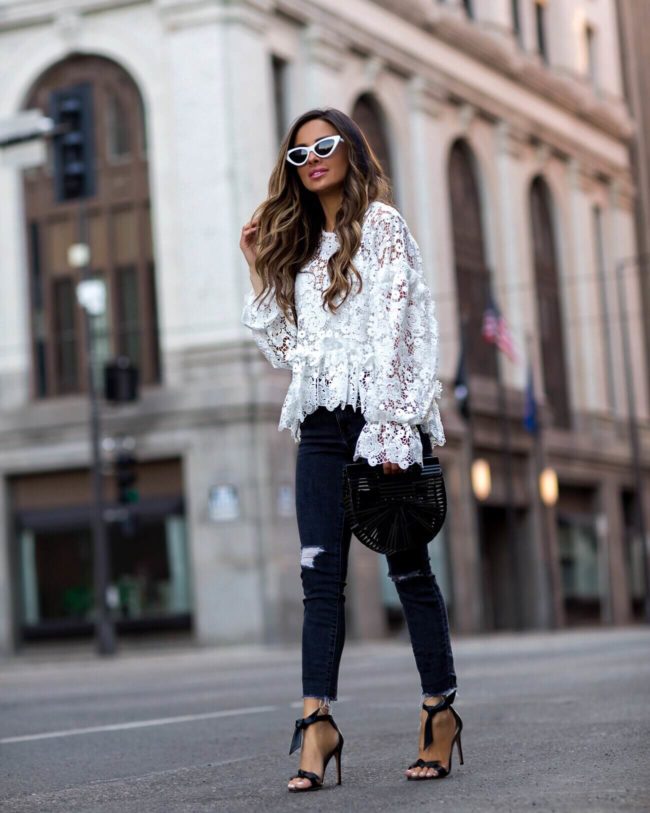 fashion blogger mia mia mine wearing a white lace top from h&M