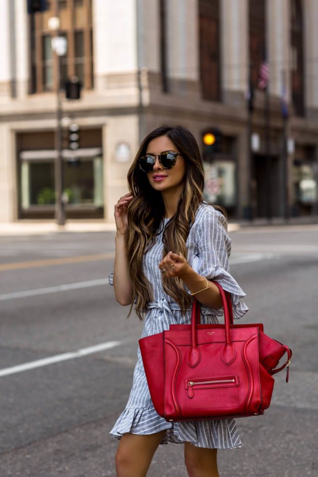 fashion blogger mia mia mine wearing a red celine bag