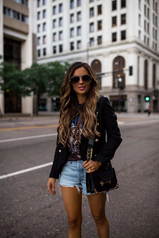 fashion blogger mia mia mine wearing an anine bing tee and a black lioness blazer