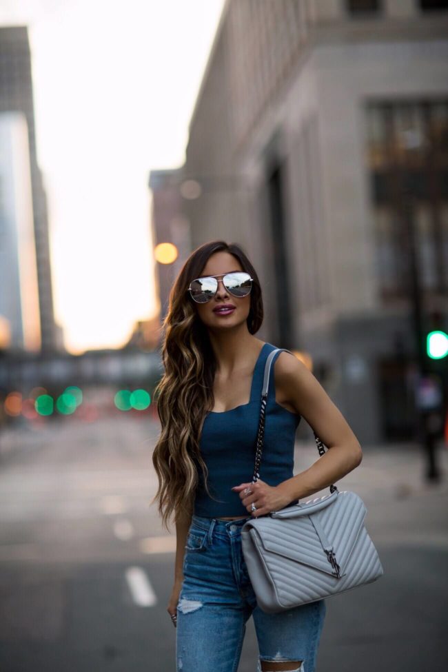 fashion blogger mia mia mine wearing aviator sunglasses and grlfrnd denim from revovle