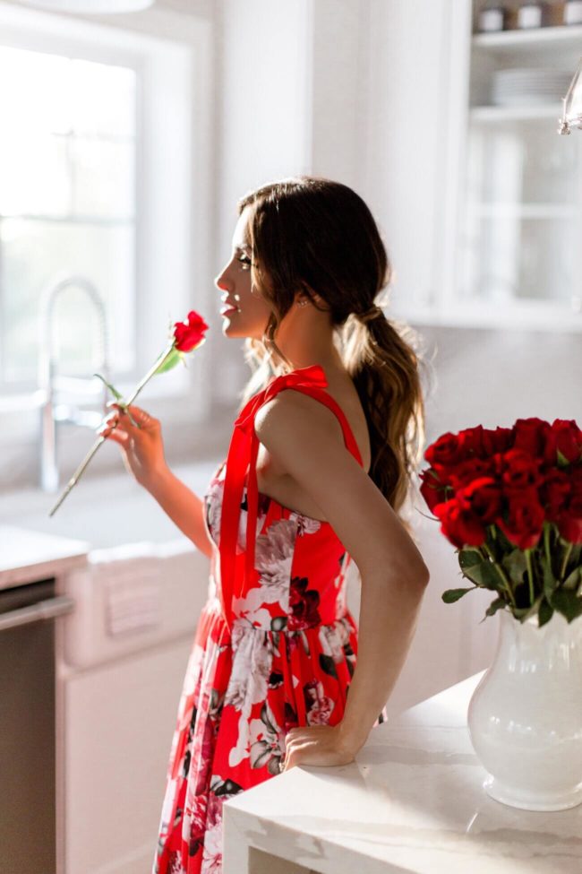 fashion blogger mia mia mine wearing a red floral maxi dress from macy's