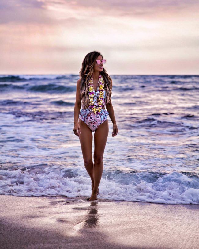 fashion blogger mia mia mine wearing one-piece swimsuit in hawaii