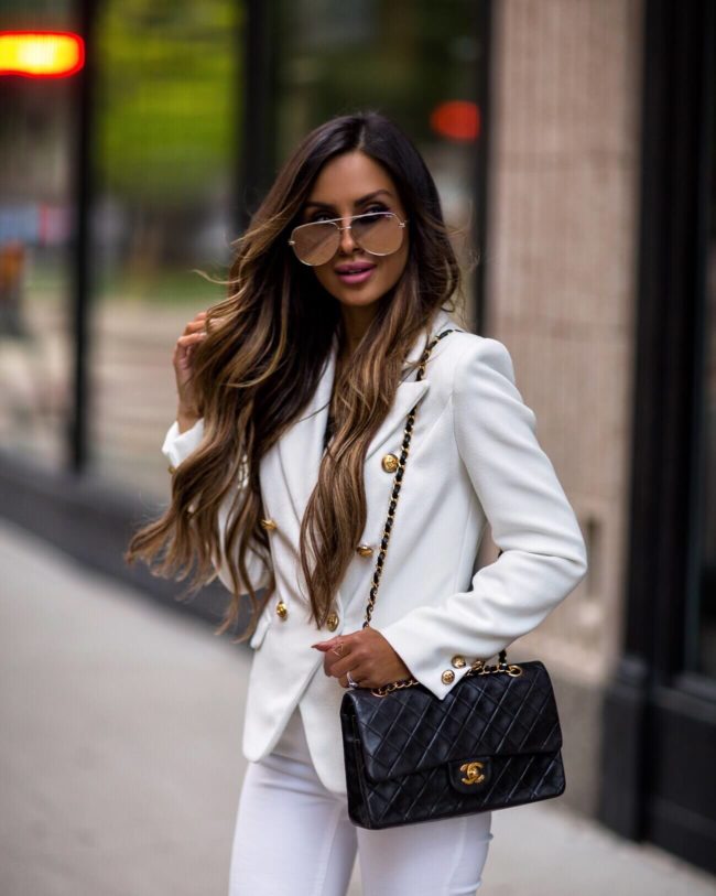 fashion blogger mia mia mine wearing a white blazer from shopbop and a chanel bag