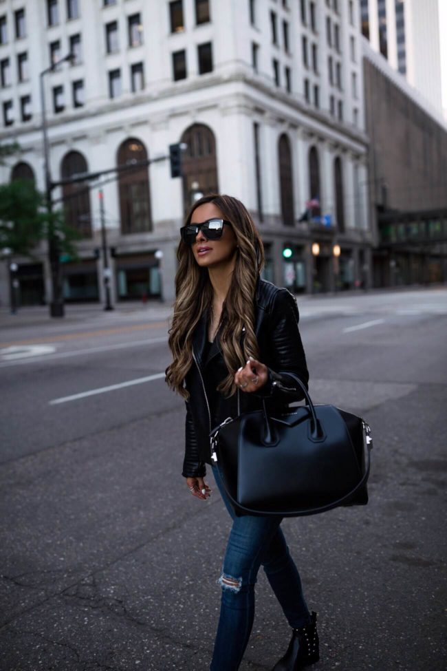 fashion blogger mia mia mine wearing a faux leather jacket from topshop and a givenchy bag from the nordstrom anniversary sale 2018