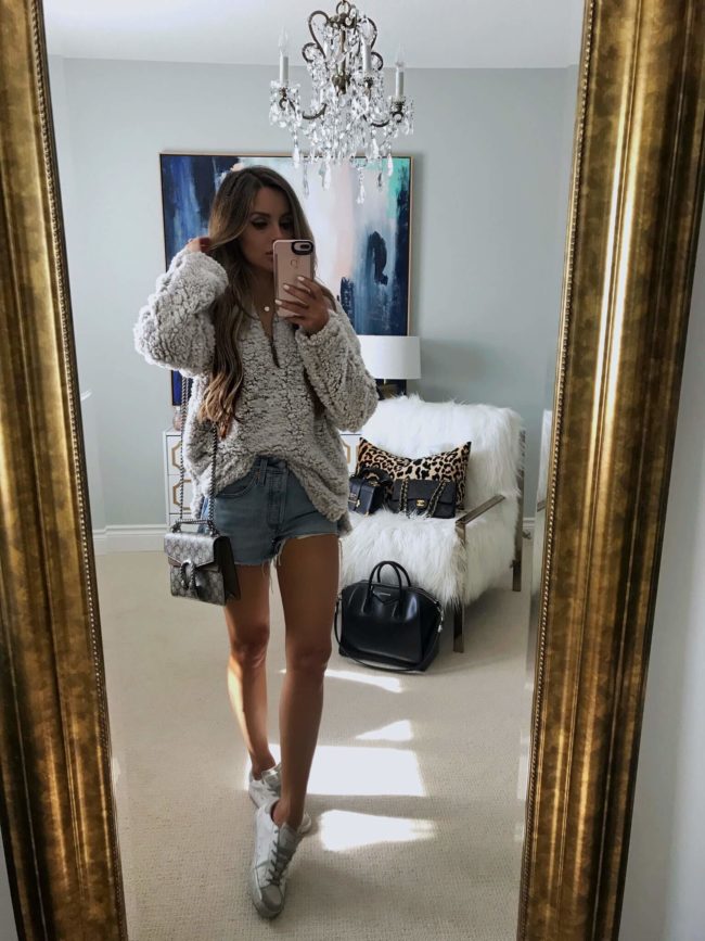 fashion blogger mia mia mine wearing a fleece pullover from the nordstrom anniversary sale 2018