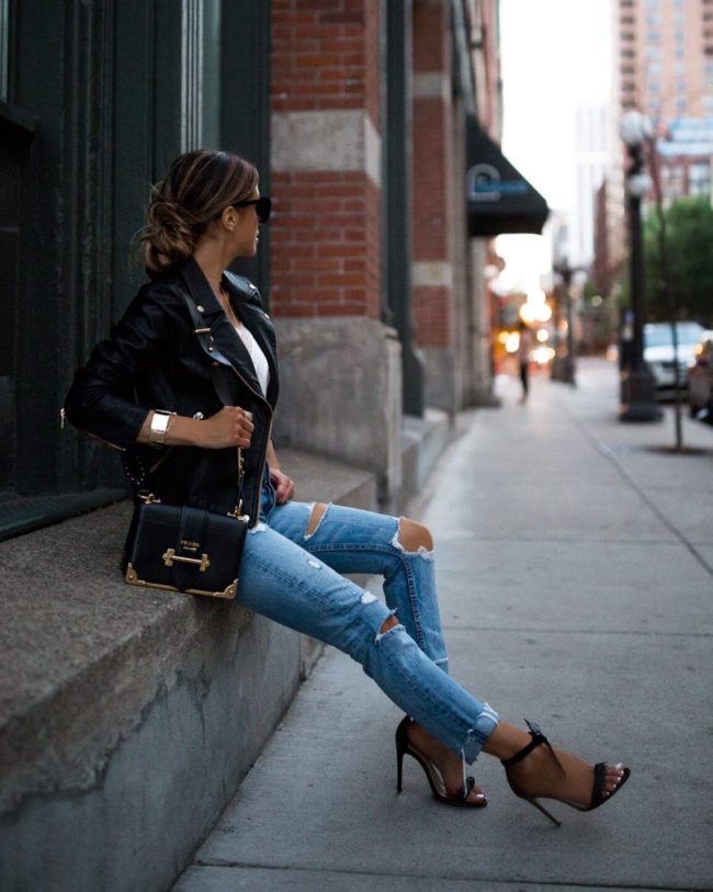 fashion blogger mia mia mine wearing a leather jacket from nordstrom and alexandre birman heels