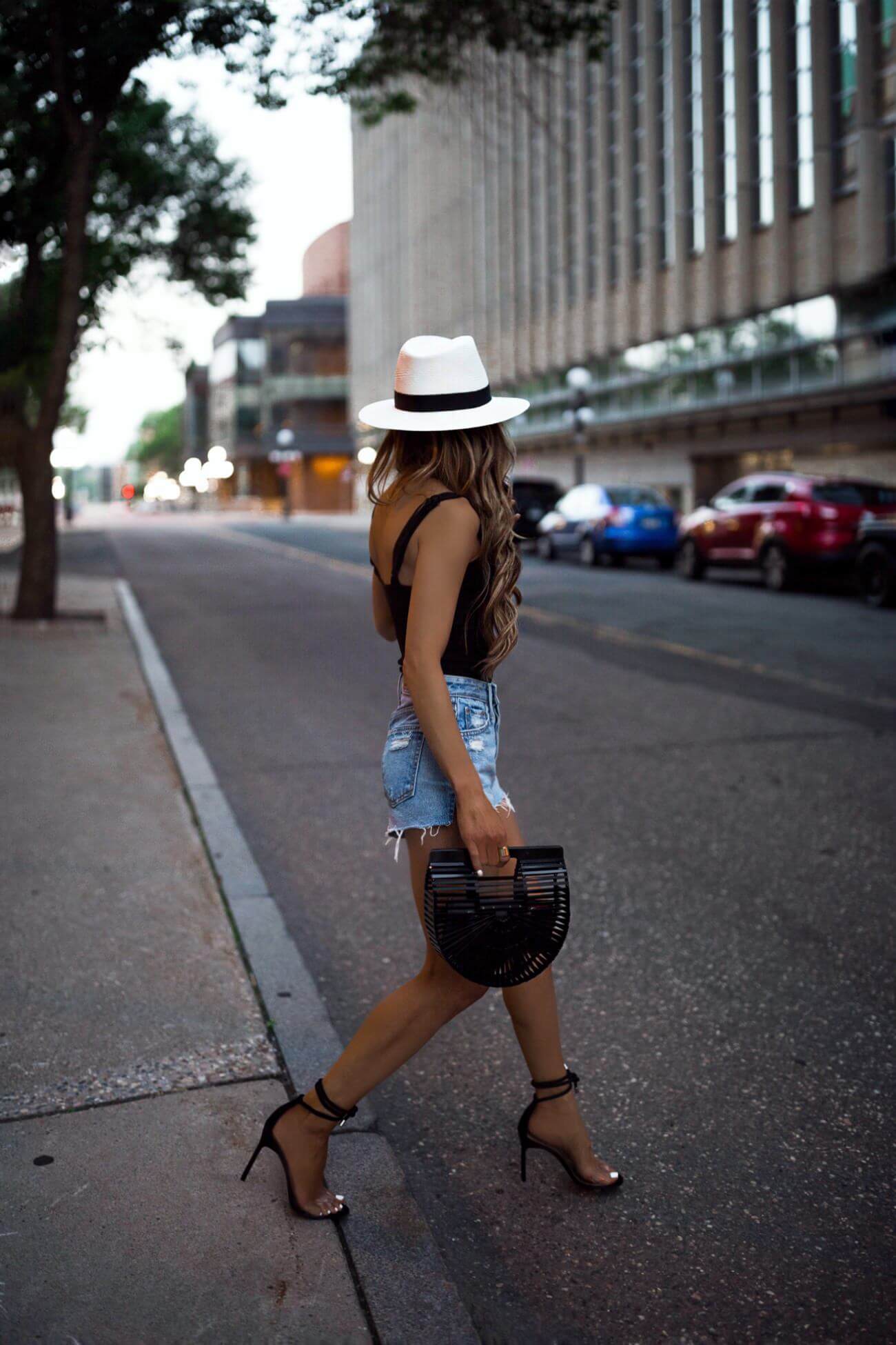 fashion blogger mia mia mine wearing a white panama hat by rag & bone and a cult gaia bag