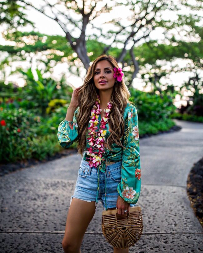 fashion blogger mia mia mine wearing a majorelle floral print top from revolve in hawaii