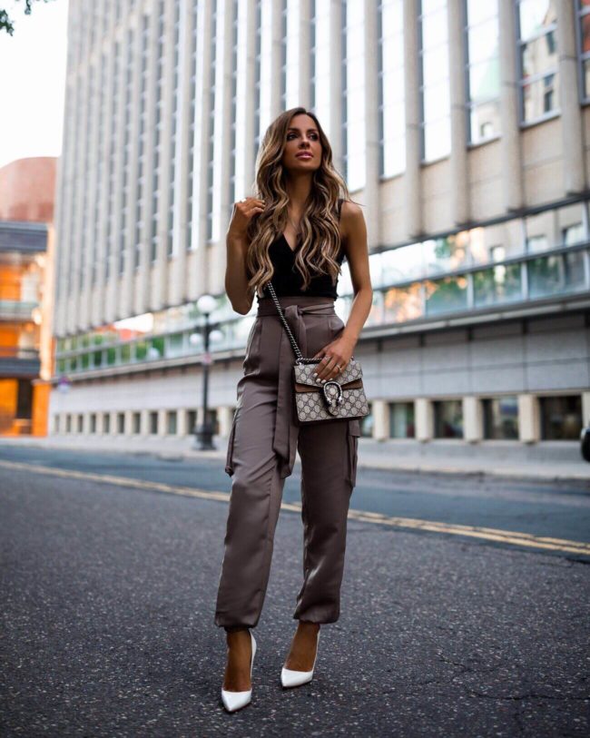 fashion blogger mia mia mine wearing jogger pants from revolve and a free people bodysuit