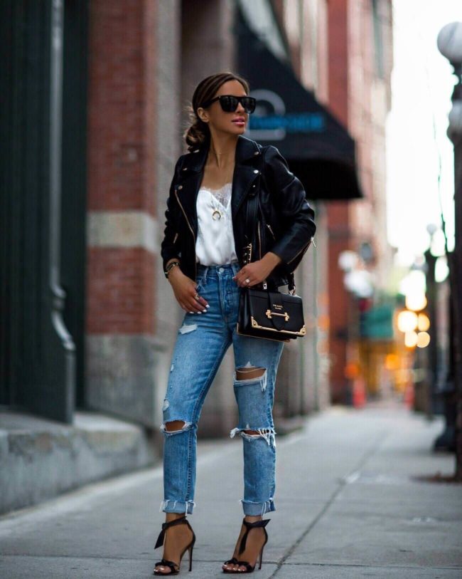 fashion blogger mia mia mine wearing a faux leather jacket from nordstrom and a prada cahier bag