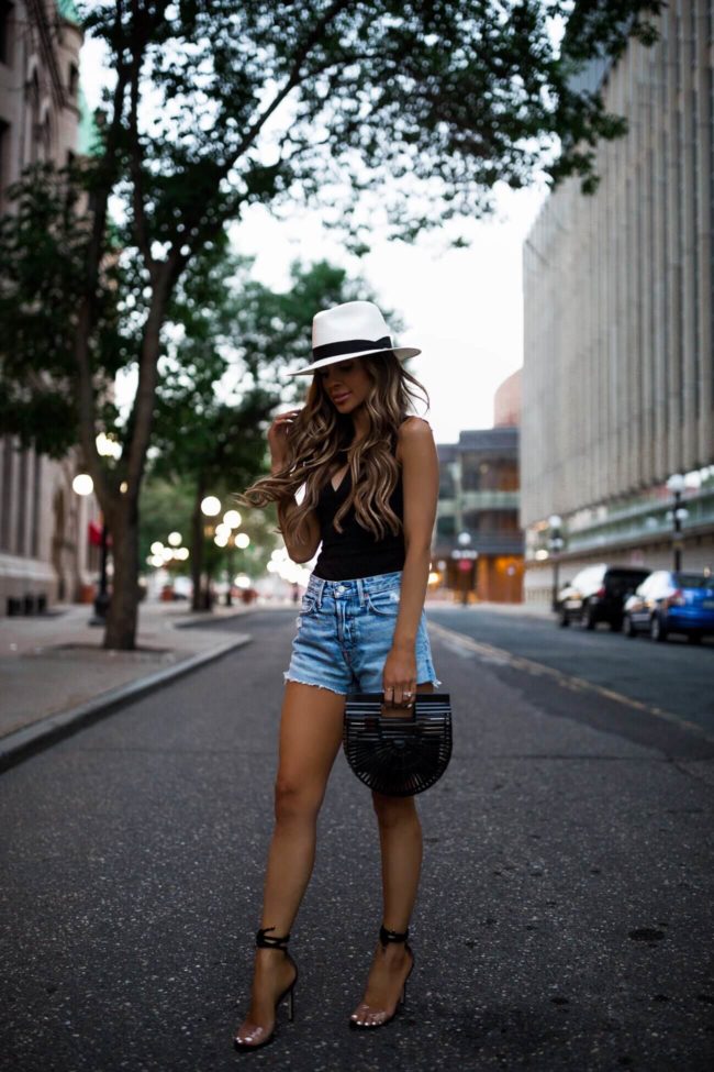 fashion blogger mia mia mine wearing a white rag & bone panama hat and jimmy choo heels