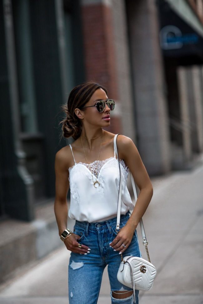 fashion blogger mia mia mine wearing a white lace cami by caminyc and a gorjana pendant necklace