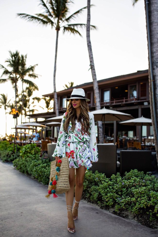 fashion blogger mia mia mine wearing a floral print dress by rococo sand from revolve