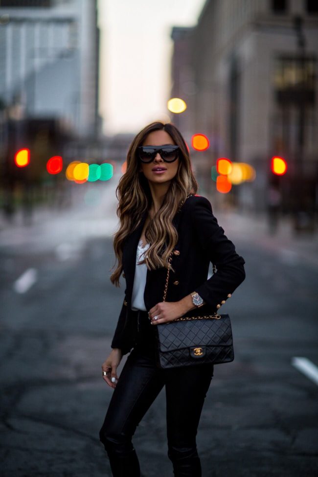 fashion blogger mia mia mine wearing a chanel double flap bag and celine sunglasses