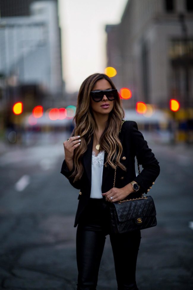 fashion blogger mia mia mine wearing a lioness blazer and celine sunglasses