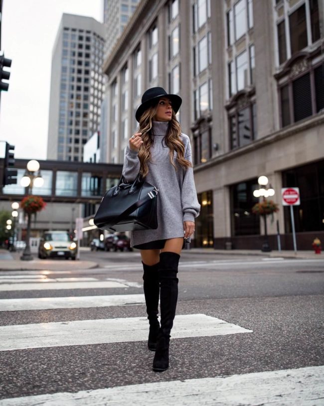 fashion blogger mia mia mine wearing a gray free people sweater and stuart weitzman over-the-knee boots from nordstrom
