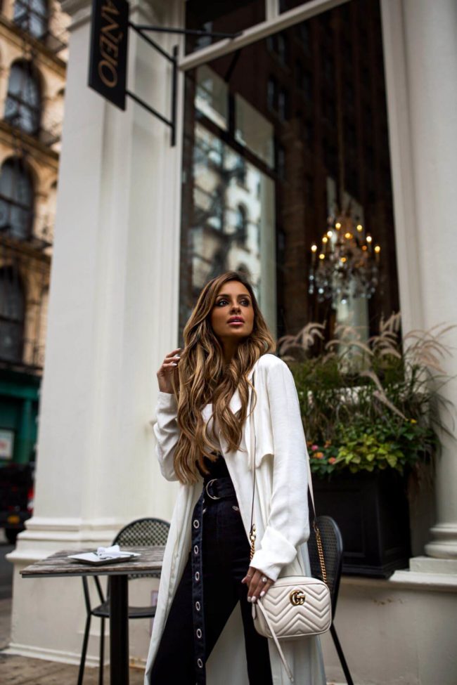 Where to Save vs Splurge on Cult-Favorite Beauty Products | MiaMiaMine.com | fashion blogger mia mia mine wearing a white duster and grlfrnd denim from revolve