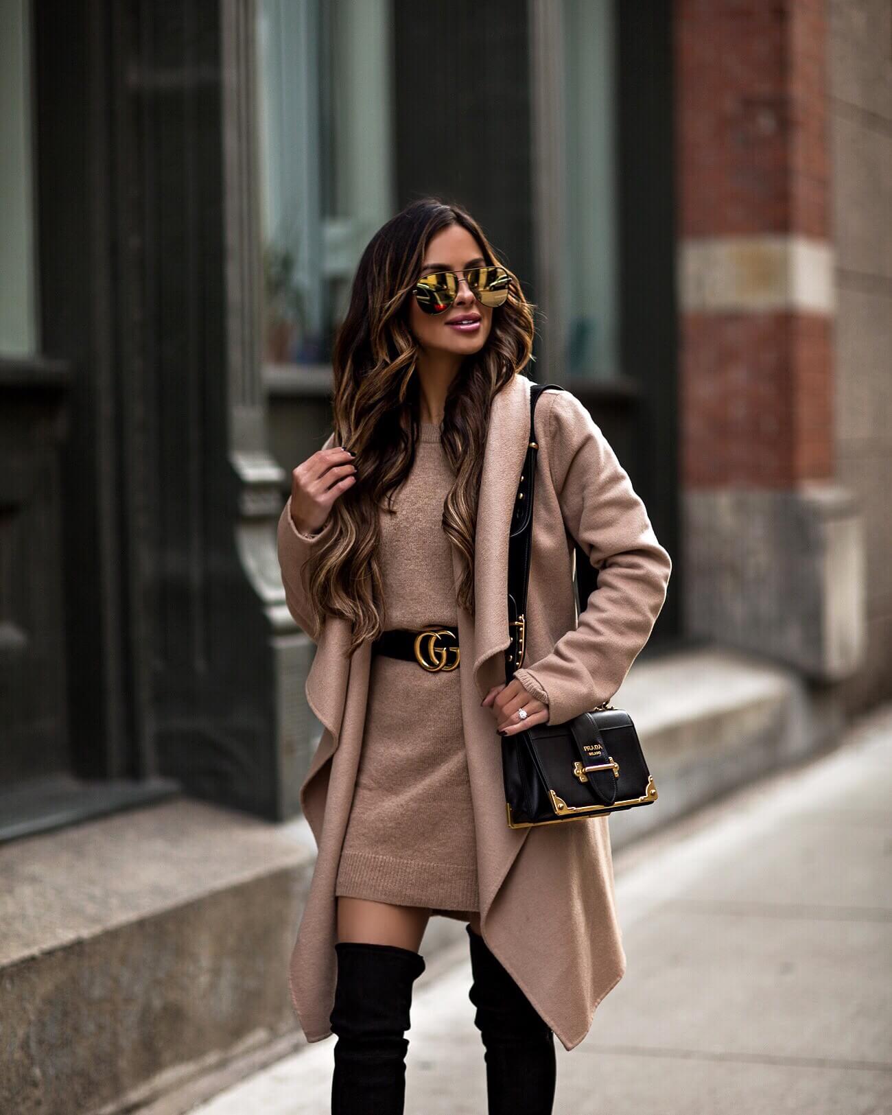 fashion blogger mia mia mine wearing a camel coat from nordstrom and a gucci belt and prada cahier bag