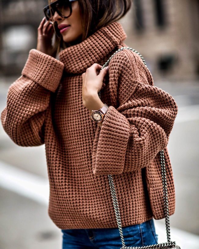 fashion blogger mia mia mine wearing a chunky knit sweater for fall