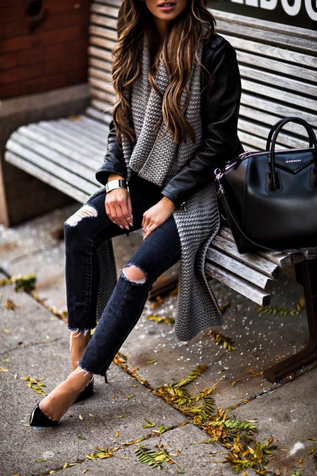 fashion blogger mia mia mine wearing a grey chunky scarf and a givenchy antigona bag